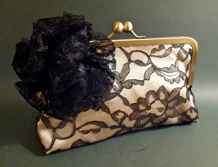 This delicate lace clutch would be ideal with your LBD at the holiday party!