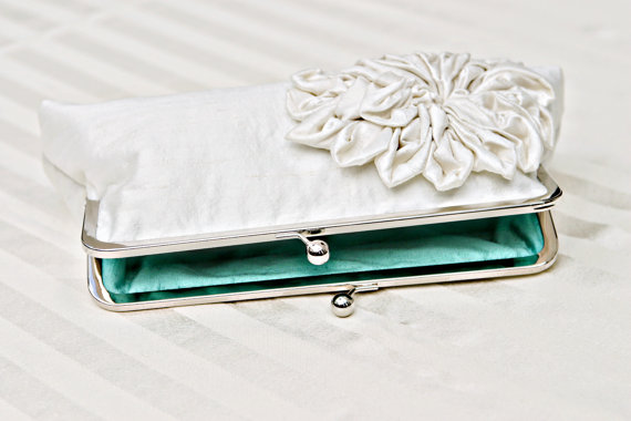 Karina also makes bridal clutches.  Looking for something blue?
