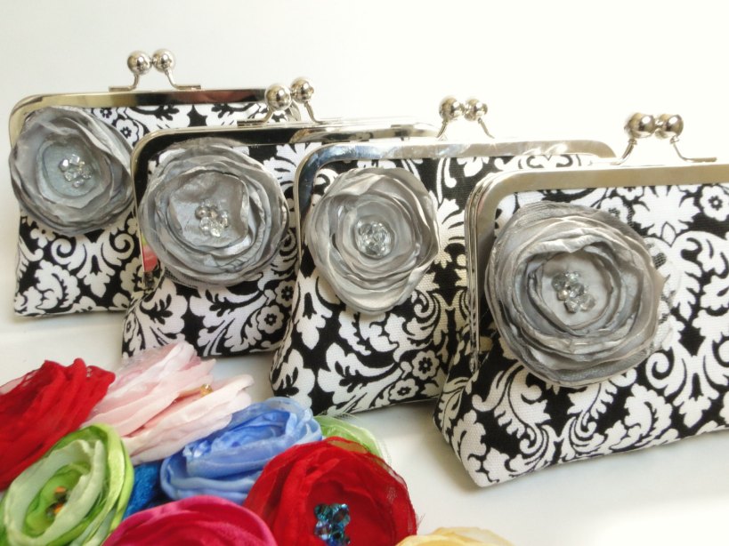 These bridesmaid clutches are embellished with Natalie's hand-made fabric flowers.
